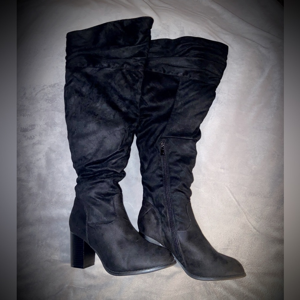 Tall black boots